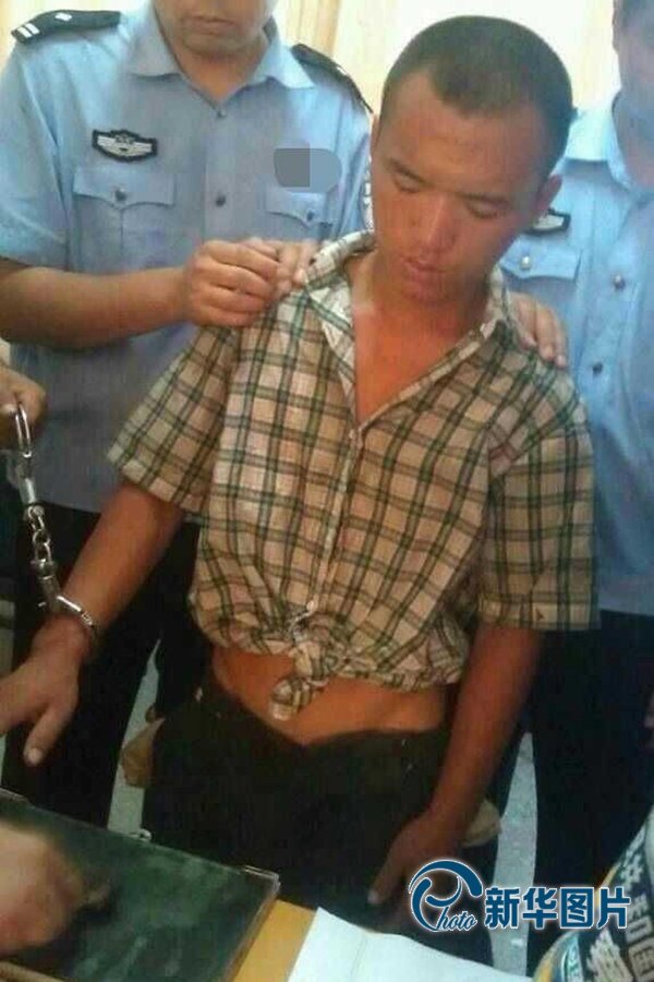 2013年8月20日午間，河南省安陽警方將“8.19公交搶劫案”嫌犯24歲的周江波緝拿歸案。圖片來