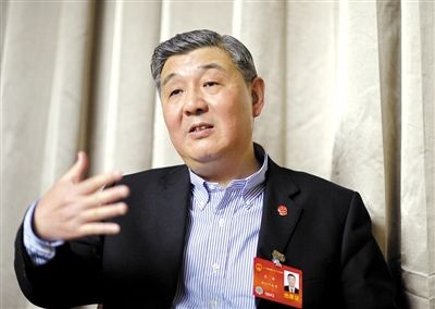 今年全國兩會期間，全國人大代表、浙江高院院長齊奇接受記者采訪。新京報記者 陳杰 攝